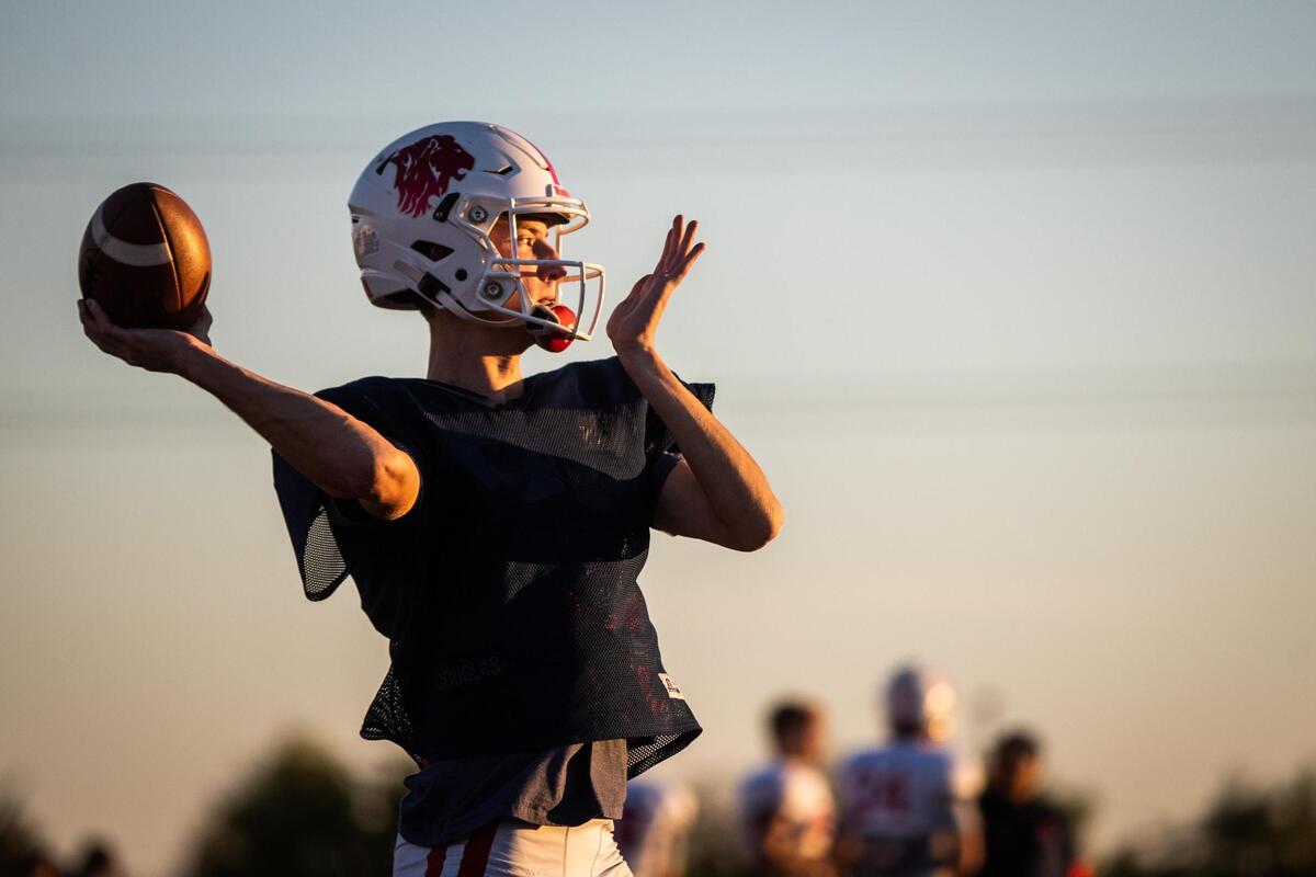 Quarterback Chase Cross throws the ball during football practice Monday, Nov. 2, 2020, at Grapevine Faith. Cross will face his older brother when the team faces their rivalry, Fort Worth Faith, on Nov. 6.