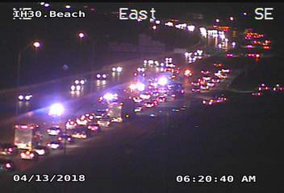 Traffic backs up on Interstate 30 eastbound early Friday morning due to a bus crash.