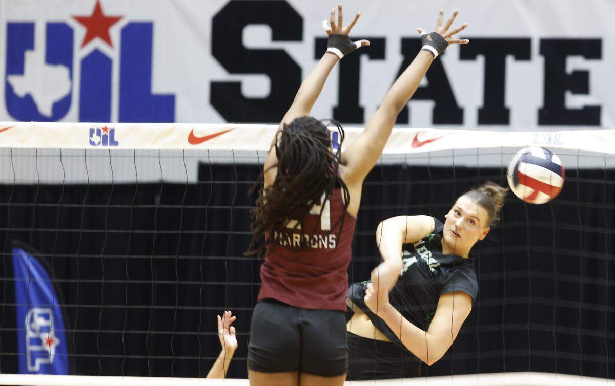 Match MBP, Southlake Carroll middle blocker Kinsley Young (14) hits the ball into the net against Austin during the first set of the UIL Class 6A Division II state volleyball championship game Saturday Nov. 22, 2025 at Curtis Culwell Center in Garland, Texas.