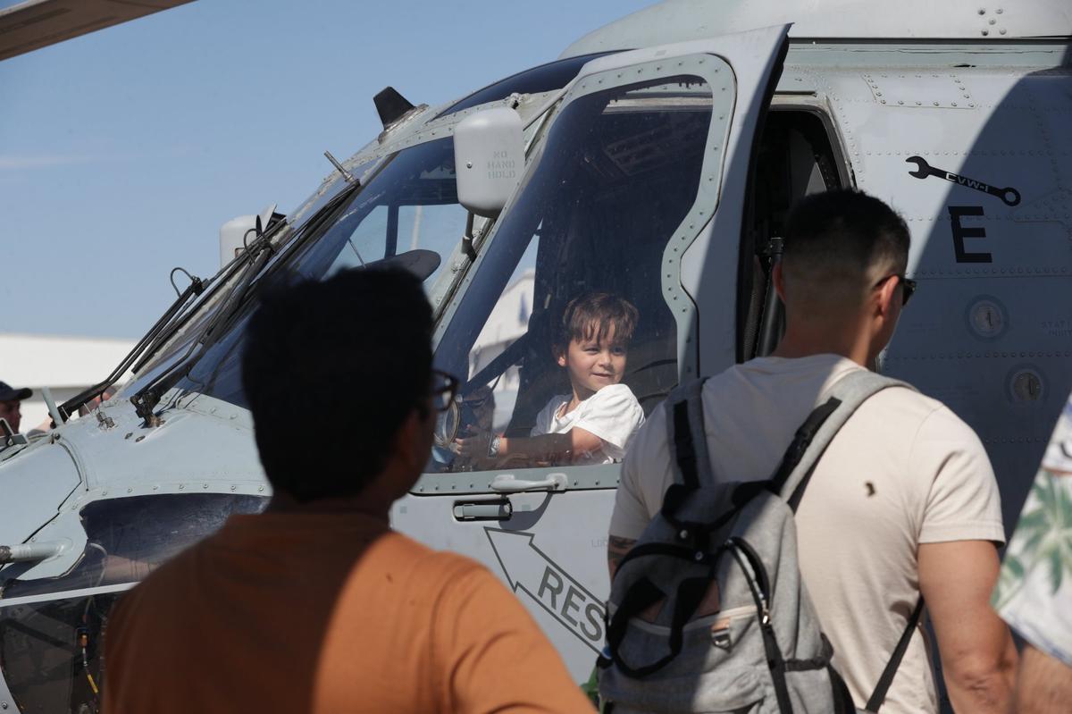 Easton McAdams, 3, sits in the cockpit of a military helicopter at the Fort Worth Alliance Airport in Fort Worth on Saturday, Oct. 22, 2022. The event offered interactive and educational opportunities face-to-face with aircrafts spread across the tarmac.