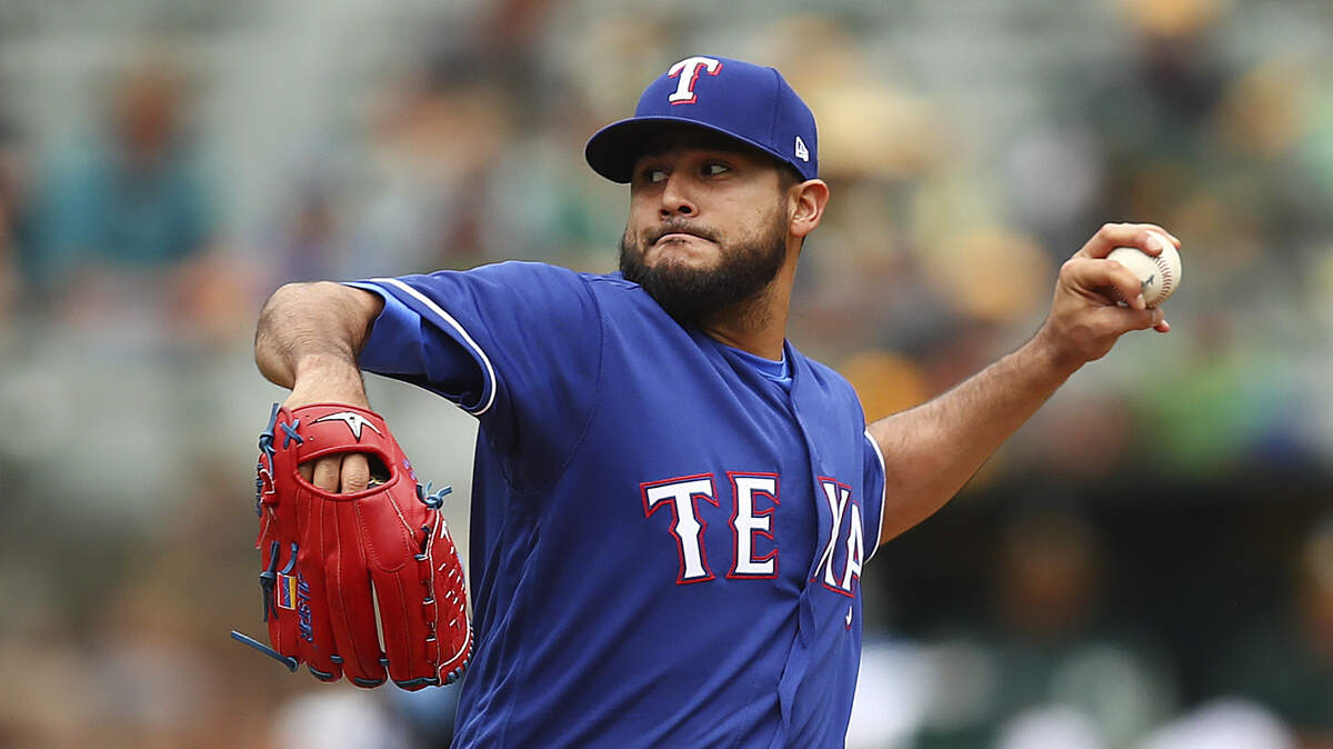 Rangers pitcher Martin Perez allowed three runs on 10 hits in 5 1/3 innings and was the winning pitcher in his 2018 debut.