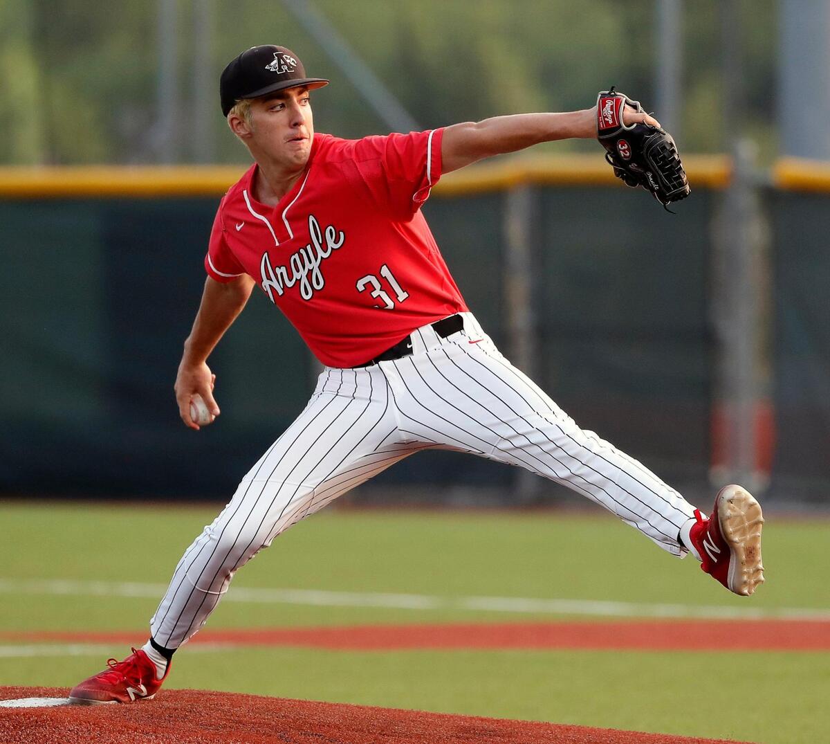 Argyle pitcher Evan Brandt (31) works the first inning during game one of the UIL 4A Region 1 quarterfinals baseball game at Northwest High School in Justin, Texas, Friday, May 20, 2022. Brandt finished up the night with a pitch count of 78. Argyle defeated Springtown 2-0. (Special to the Star-Telegram Bob Booth)