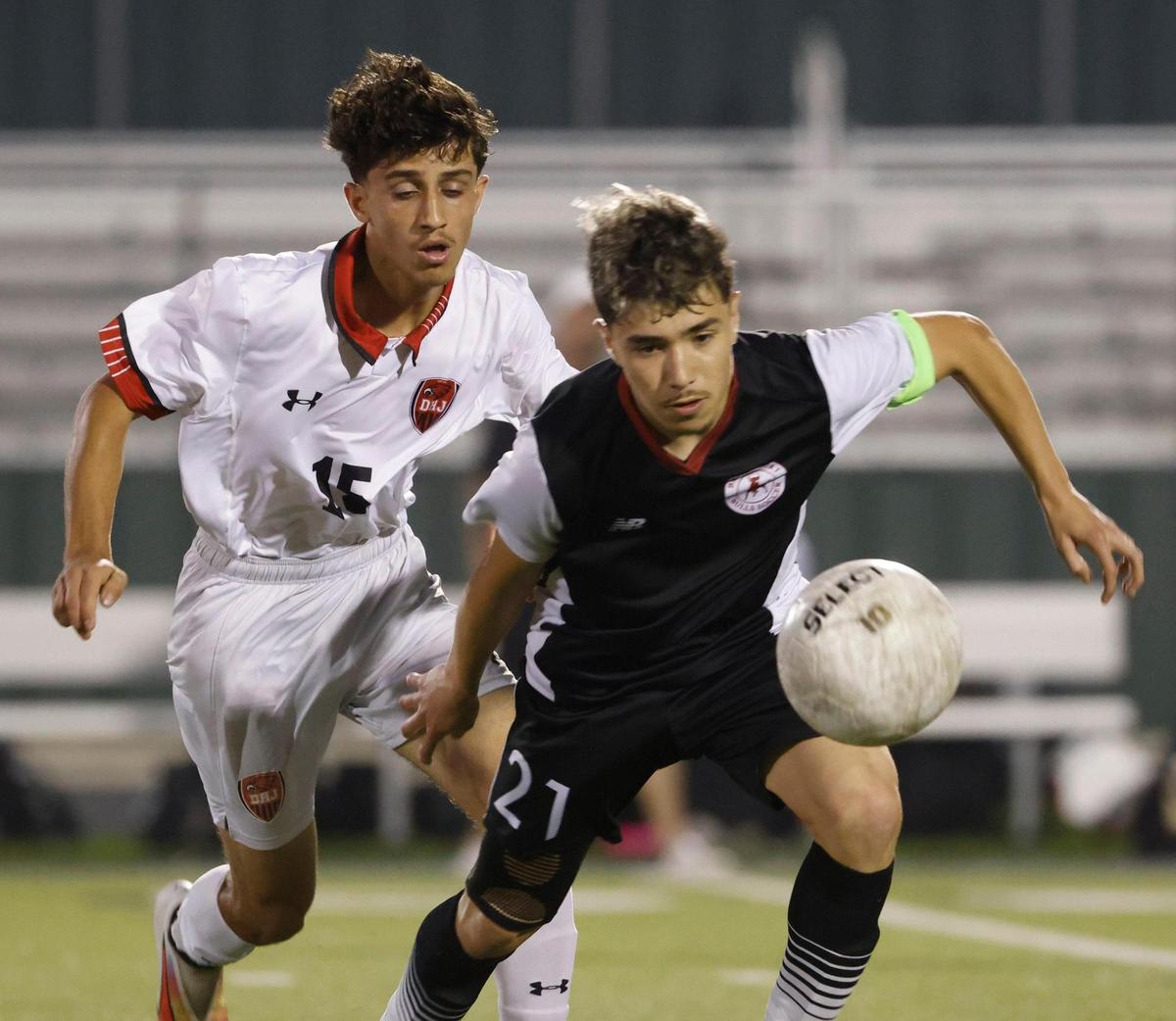 Bridgeport defender Norberto Montes De Oca (21) cuts in front of Diamond Hill-Jarvis Faizi Shaib (15) during the Class 4A D2 regional final UIL boys soccer playoff game at Keller ISD Stadium in Keller, Texas, Tuesday, Apr. 01, 2025.