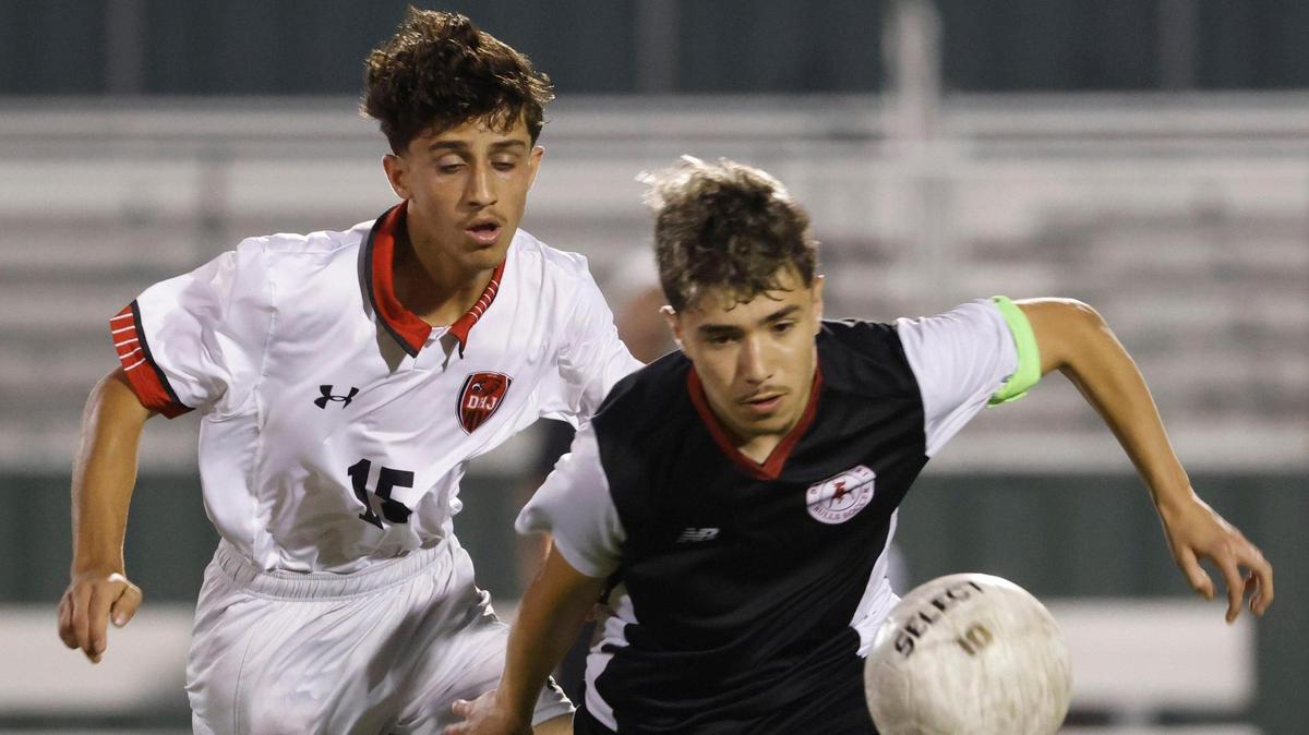 Bridgeport defender Norberto Montes De Oca (21) cuts in front of Diamond Hill-Jarvis Faizi Shaib (15) during the Class 4A D2 regional final UIL boys soccer playoff game at Keller ISD Stadium in Keller, Texas, Tuesday, Apr. 01, 2025.