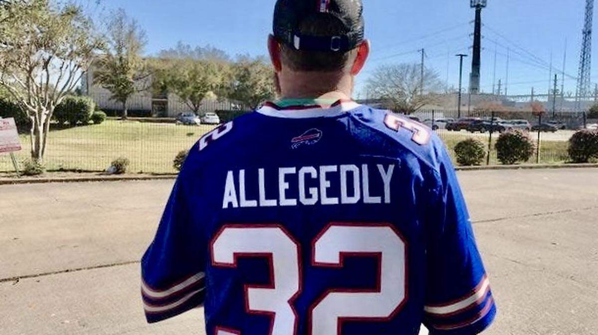 A Buffalo Bills fan wears a custom-made O.J. Simpson jersey Jan. 4, 2020, before an AFC playoff game between the Bills and Houston Texans in Houston.