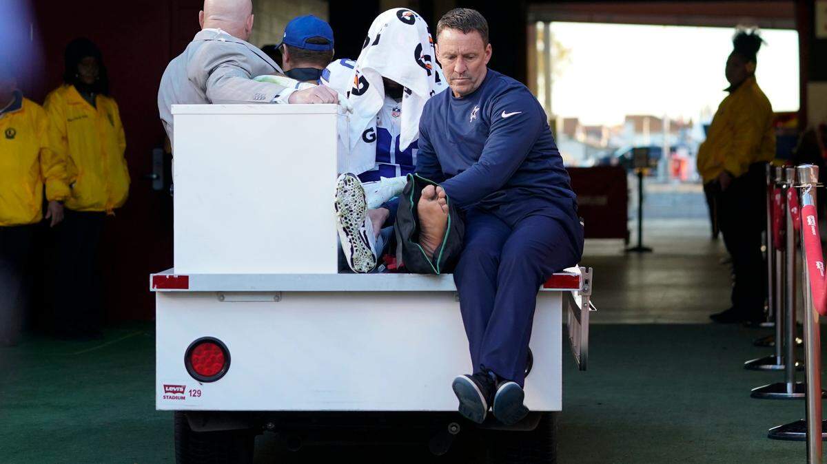 Dallas Cowboys running back Tony Pollard, middle, is carted off the field during the 19-12 loss to the San Francisco 49ers. Pollard suffered a fractured left fibula and will be out 3-4 months