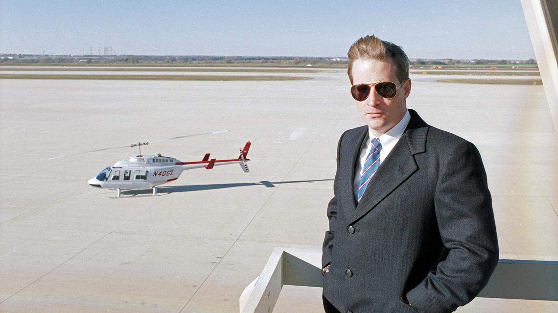 Dec. 5, 1990: Ross Perot Jr. poses at Alliance Airport in Fort Worth with a helicopter in the background.