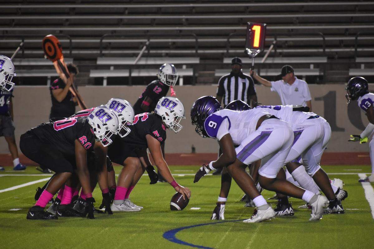 Paschal and Crowley faceoff during a high school football game at Farrington Field in Fort Worth, Texas, Friday, October 13, 2023.