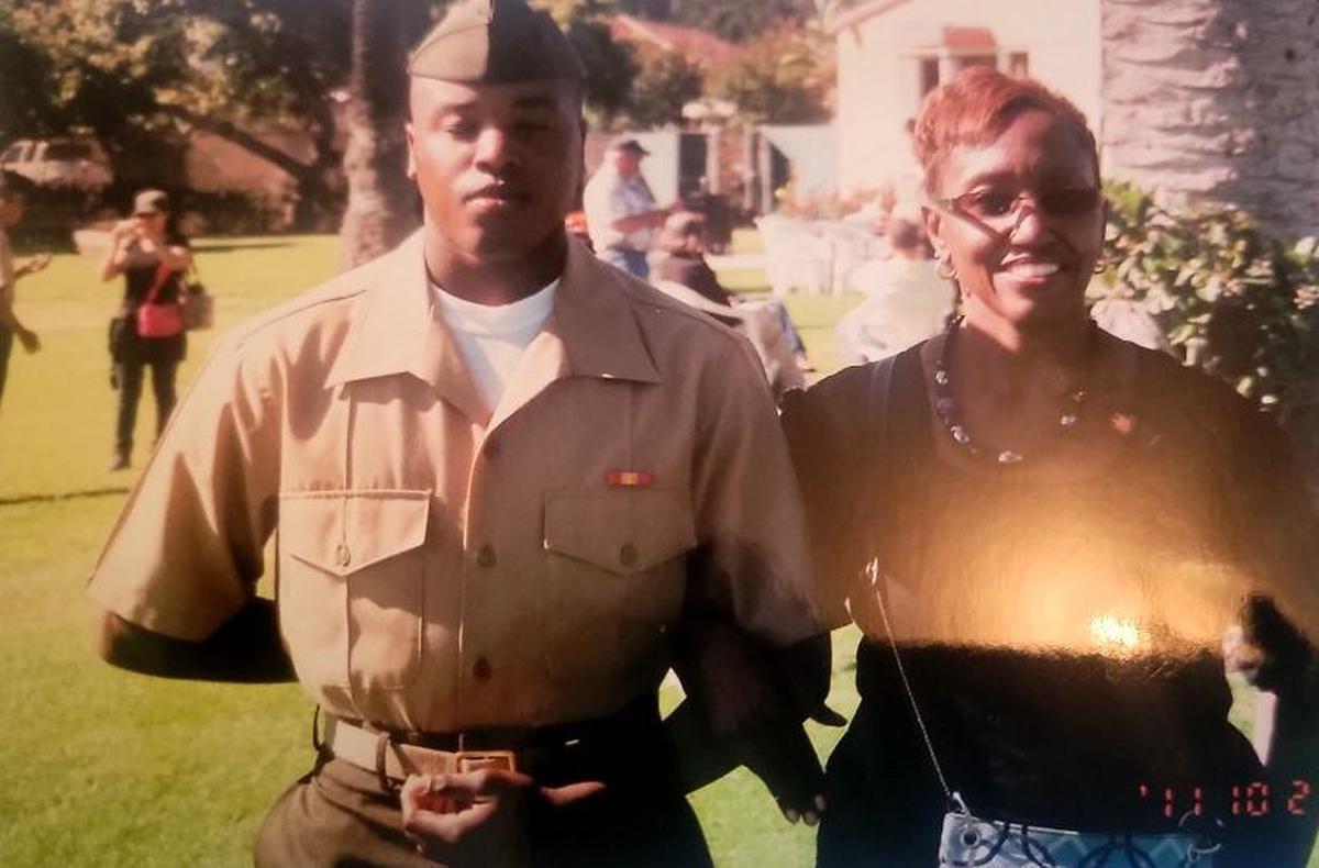 Anthony Johnson Jr. with his mother, Jacqualyne, in a family photo.