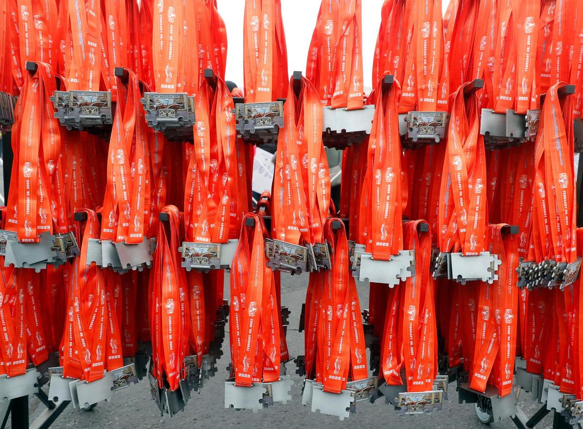 Thousands of medals lined racks for the 2023 Cowtown Marathon in Fort Worth, Texas, Sunday, Feb. 26, 2023. Almost 21,000 runners registered for the two day event. (Special to the Star-Telegram Bob Booth)