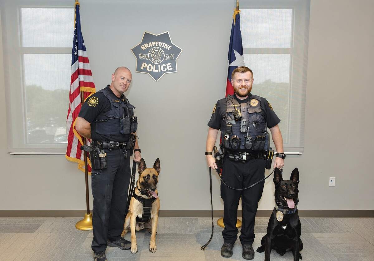 Grapevines two K9s and their handlers officers Lappe (left) and Poole (right)