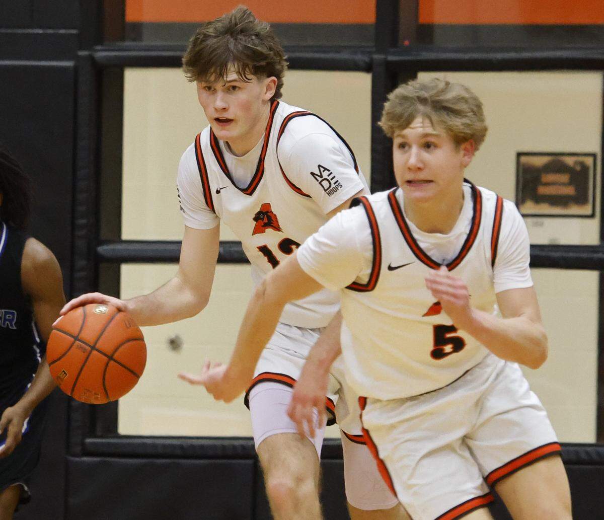 Aledo center Townes VanHuysen (13) drives down court against Brewer during the first half of a UIL boys basketball game at Aledo High School in Aledo, Texas, Friday Feb. 13, 2026.