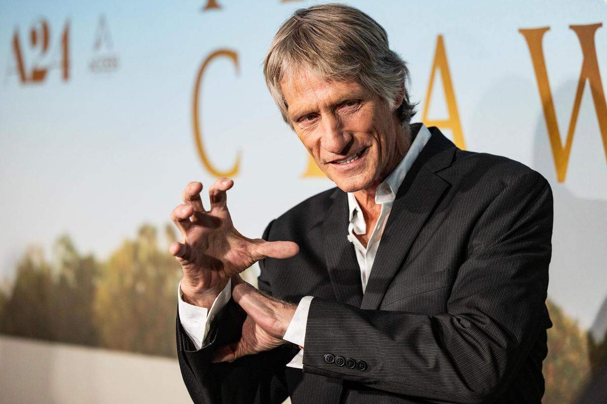 WWE Hall of Fame member Kevin Von Erich poses for photos on the red carpet for the world premiere of the movie “The Iron Claw,” at the Texas Theater in Dallas on Wednesday, Nov. 8, 2023. The movie is a true story about his North Texas-based Von Erich family, who were big names in the wrestling world in the ’70s and ’80s before tragedy struck.
