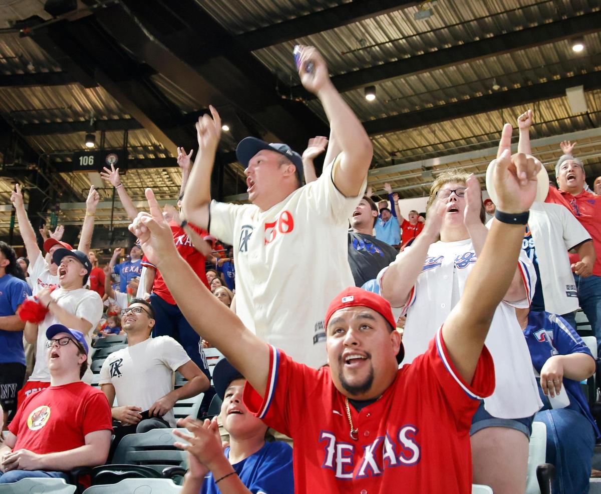 Fans cheer a first inning home run during the ACLS game 7 watch party at Globe Life Field in Arlington, Texas, Friday, Oct. 23, 2023. Rangers led 4-1 in the top of the third. (Special to the Star-Telegram Bob Booth)