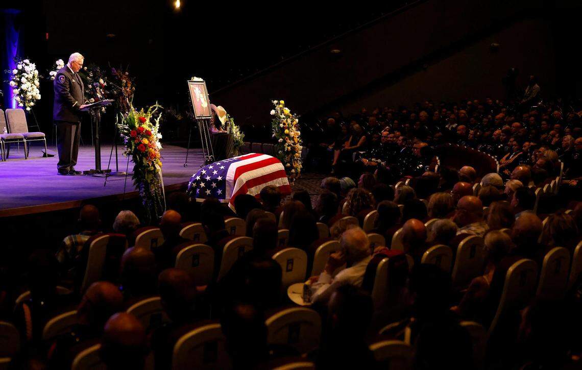 Arlington Chaplain Rick Burgin speaks at the funeral for Officer Darrin McMichael on Wednesday, September 27, 2023, at Crossroads Christian Church in Grand Prairie. McMichael, a member of Arlington’s Motorcycle Unit, was killed on Sept. 21.