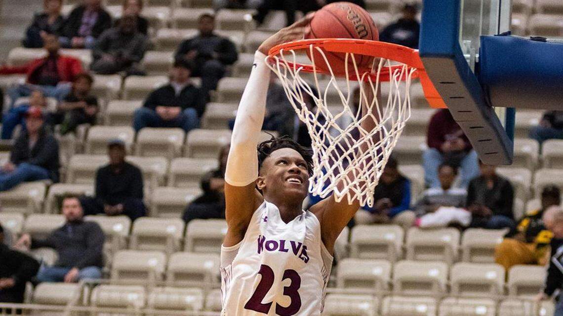 Timberview senior Trazarien White goes for a dunk.