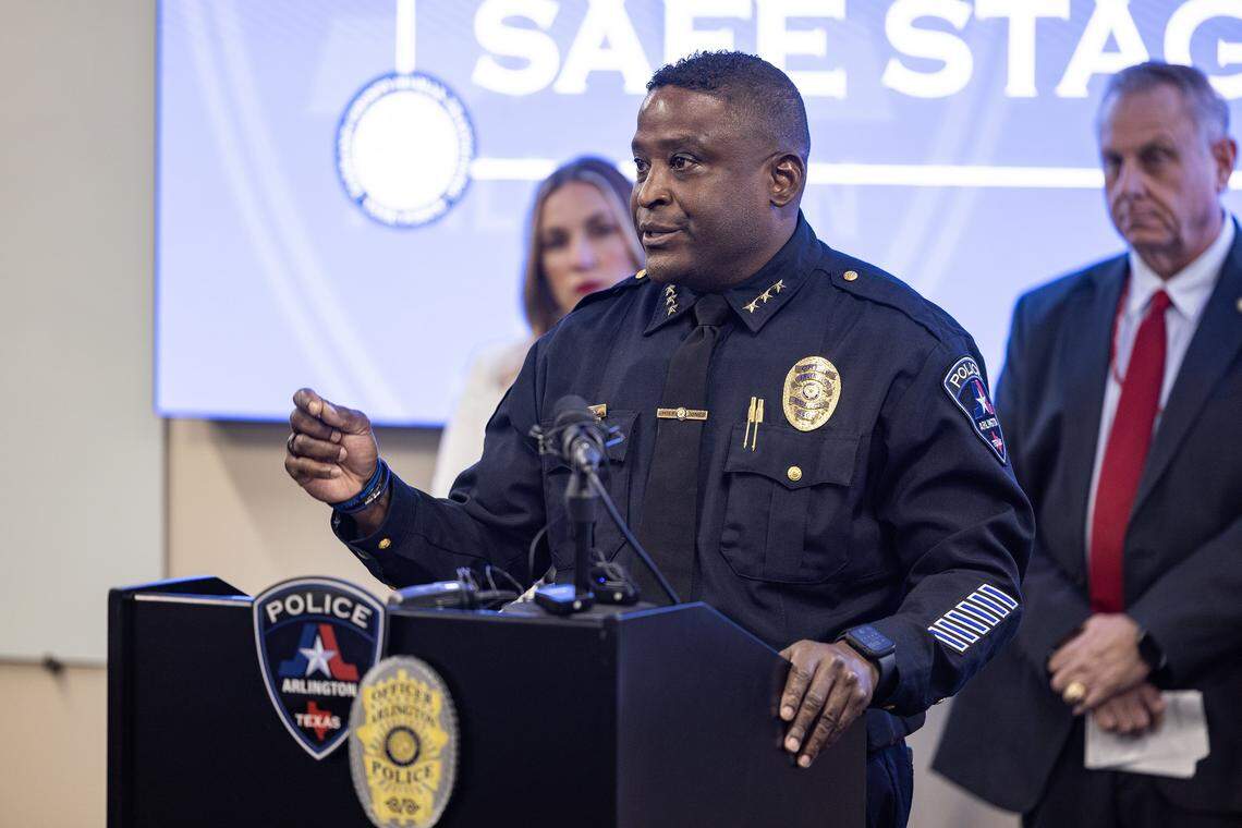 Alexander Jones, the Arlington Chief of Police, along with other law enforcement personnel and community members speak to the media regarding a recent joint operation that resulted in multiple arrests and the disruption of an organized sex trafficking ring in Chicas Locas adult entertainment club at the Arlington Police Department Station on Wednesday, Oct. 29, 2025.