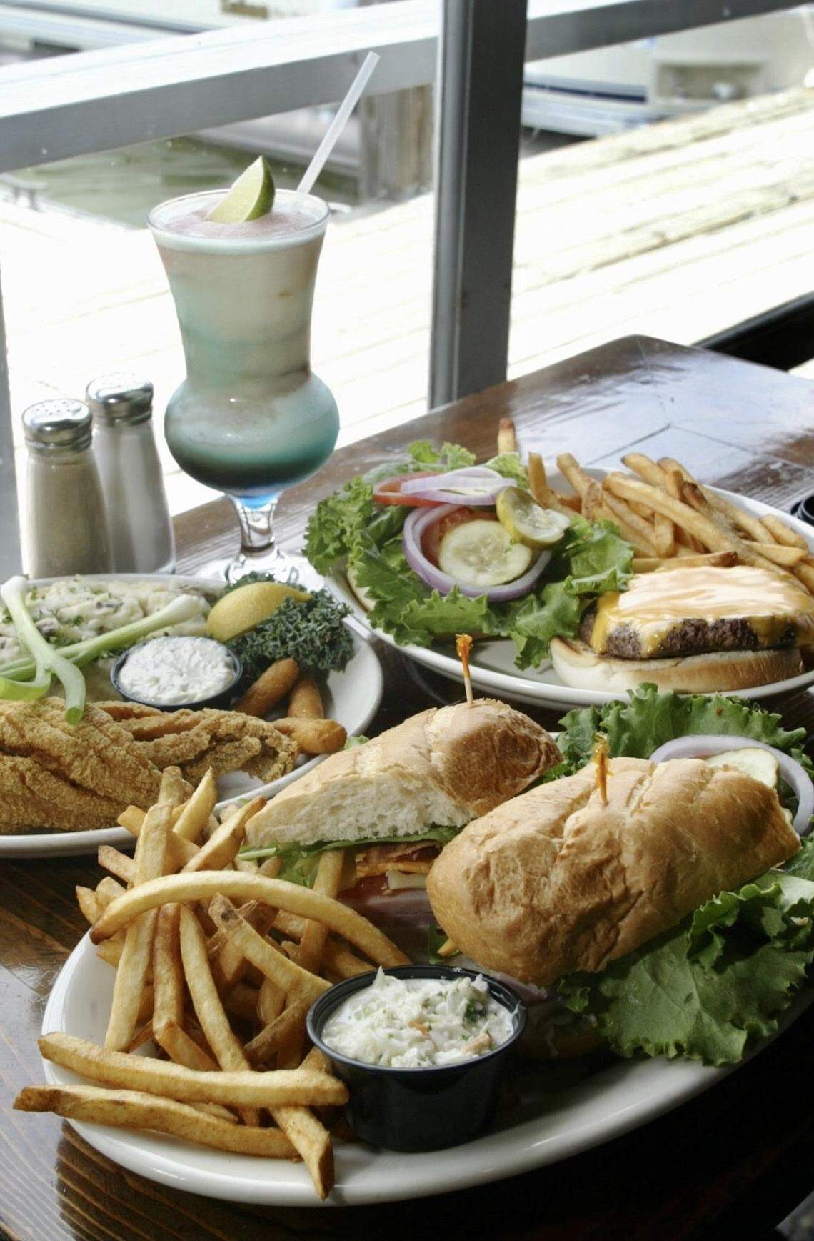 A club sandwich, cheeseburger and catfish plate at the Oasis at Joe Pool Lake.