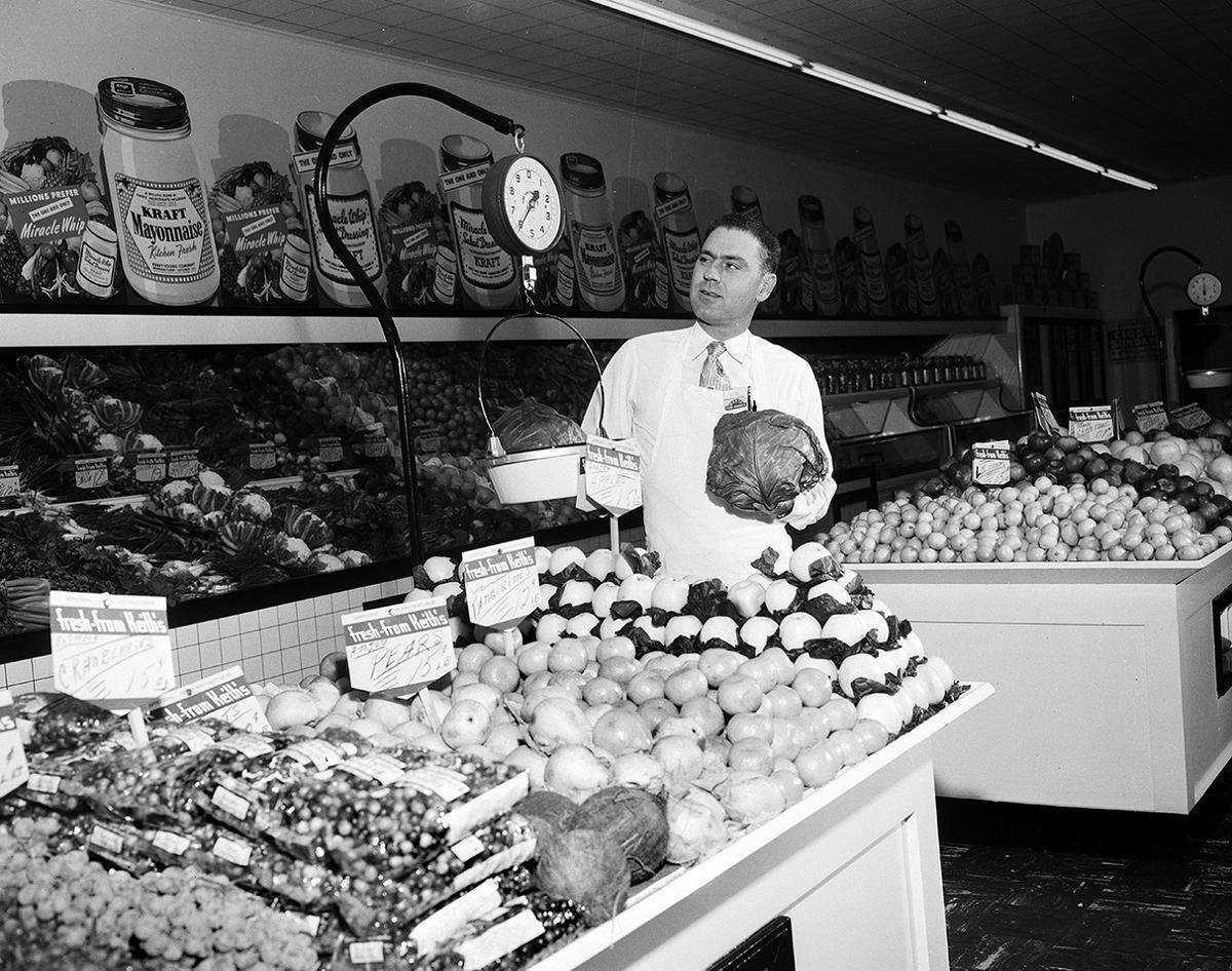 Jan. 9, 1951: John Roach, manager of the grocery department of the new Worth Food Market at 2309 Haltom Road. He is pictured weighing giant red cabbages on opening day at the store. Roach is one of the co-managers of the store, the 20th Worth market in the city. (The site today, near the corner of NE 28th Street, is a Gomez Western Wear store.)