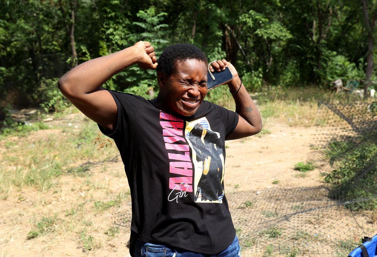 Maxine Owens reacts after being told she’s matched with an assistance program that will help Owens pay her rent for at least three months on Thursday, July 6, 2023, in Fort Worth. Owens said she’s most excited about having housing and escaping the heat.