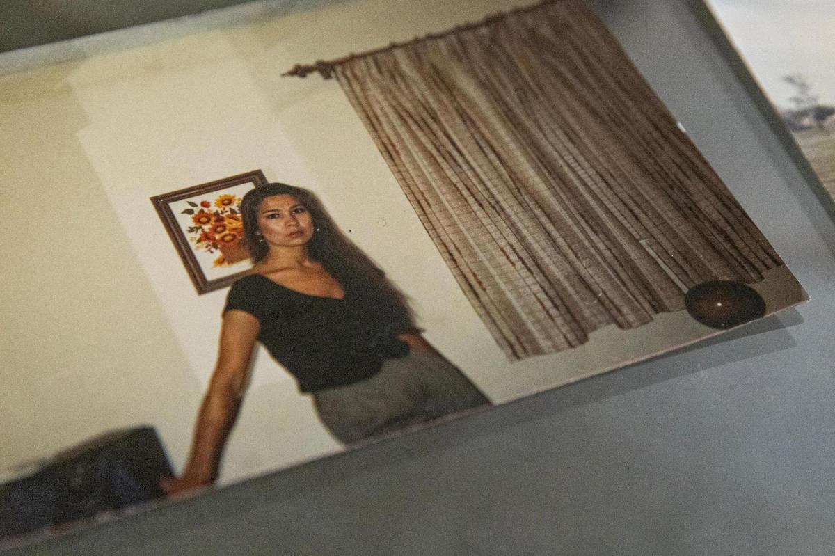 Dallas resident Alice Salas shows a photo of what she looked like in her 40’s. In 2008, Salas was diagnosed with ovarian cancer and had to undergo a full hysterectomy and chemotherapy. Now, Salas has to live with the effects of the chemotherapy that has left her scalp exposed and eyebrows bare.