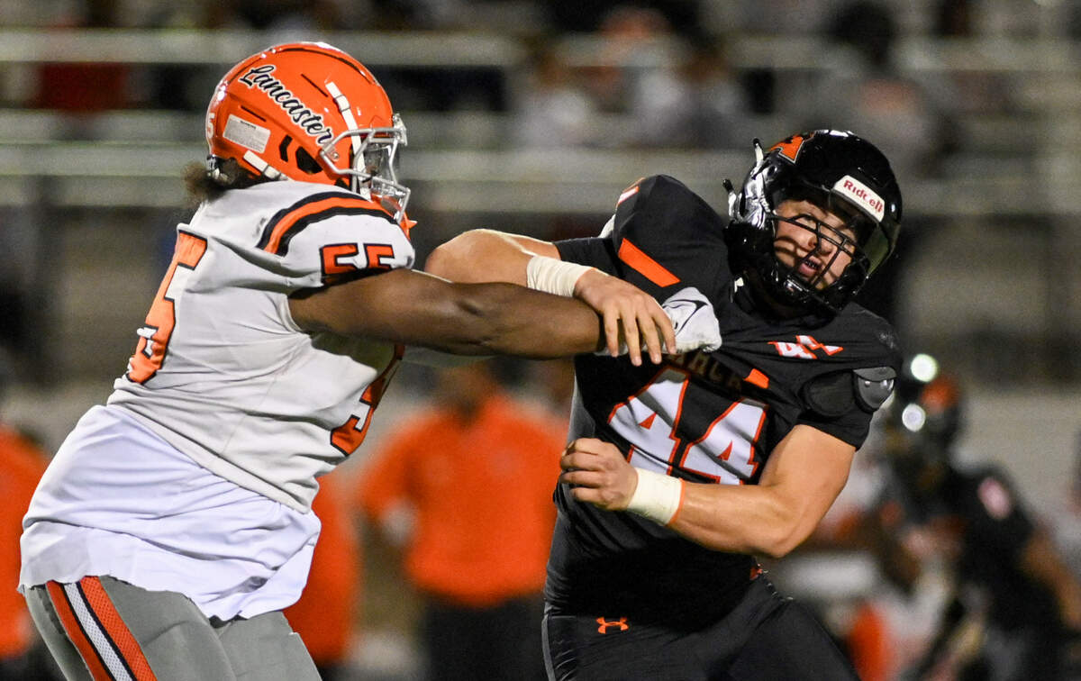Aledo defensive end Brody Adams is pushed by Lancaster center Eric Boyd during a game against Lancaster High School on Sept. 6 at Tim Buchanan Stadium. This was the first home game of the season.