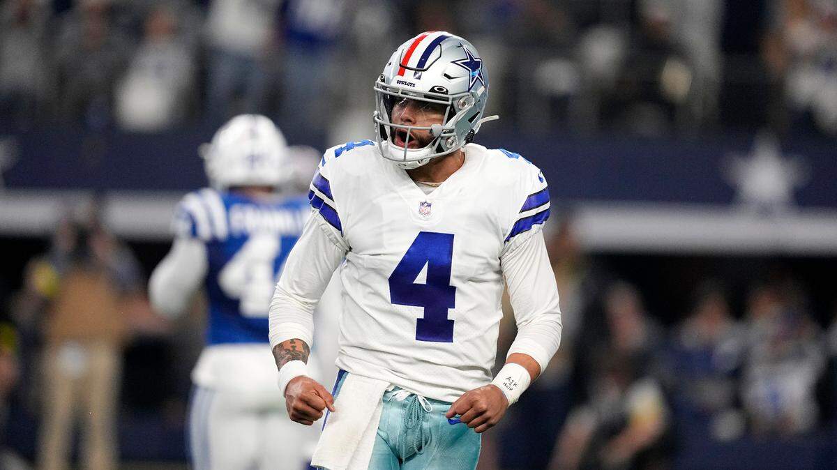 Dallas Cowboys quarterback Dak Prescott (4) celebrates after the team scored a touchdown against the Indianapolis Colts during an NFL football game Sunday, Dec. 4, 2022, in Arlington, Texas. (AP Photo/Tony Gutierrez)
