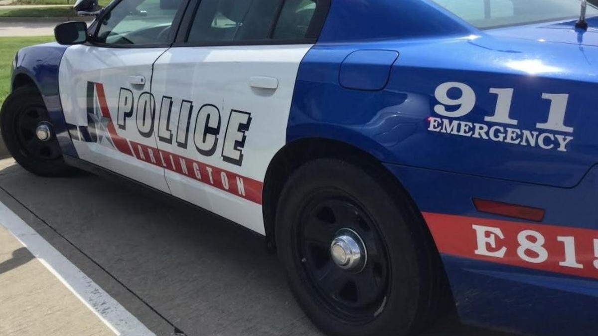 Two high school students were arrested Monday on charges of terroristic threats to Sam Houston High School. The students posted photos of themselves with toy guns, police say.