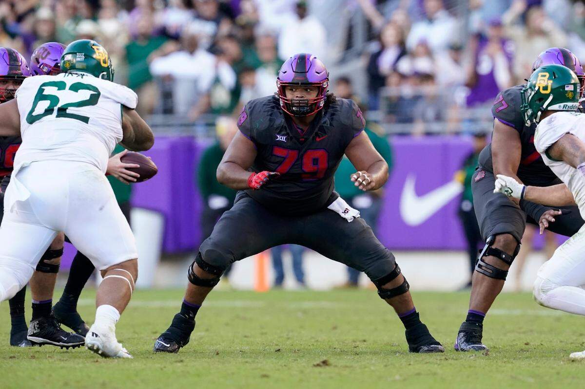 TCU center Steve Avila (79) defends against a rush by Baylor during an NCAA college football game in Fort Worth, Texas, Saturday, Nov. 6, 2021. (AP Photo/Tony Gutierrez)