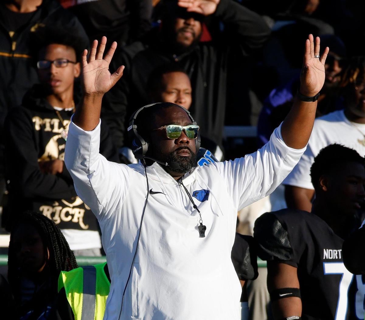 North Crowley head coach Ray Gates signals from the sidelines during the first half of a UIL Conference 6A Division I state semifinal football playoff game at Mesquite Memorial Stadium in Mesquite, Texas, Saturday, Dec. 09, 2023. Duncanville led North Crowley 24-0 at the half.