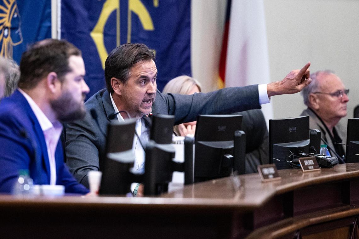 Keller ISD President Charles Randklev gets in heated debate with the event attendees during a special meeting regarding the possible split of the Keller Independent School District at the Keller ISD Education Center in Keller on Thursday, Jan. 16, 2025.