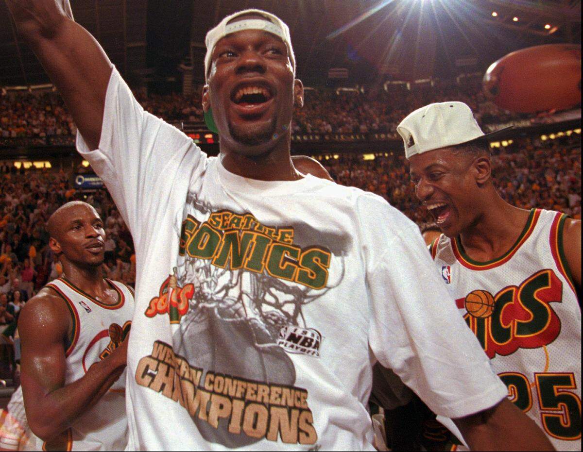 Shawn Kemp, then a Seattle SuperSonics star, sported a Western Conference championship shirt moments after his team defeated the Utah Jazz to earn a berth in the 1996 NBA Finals.