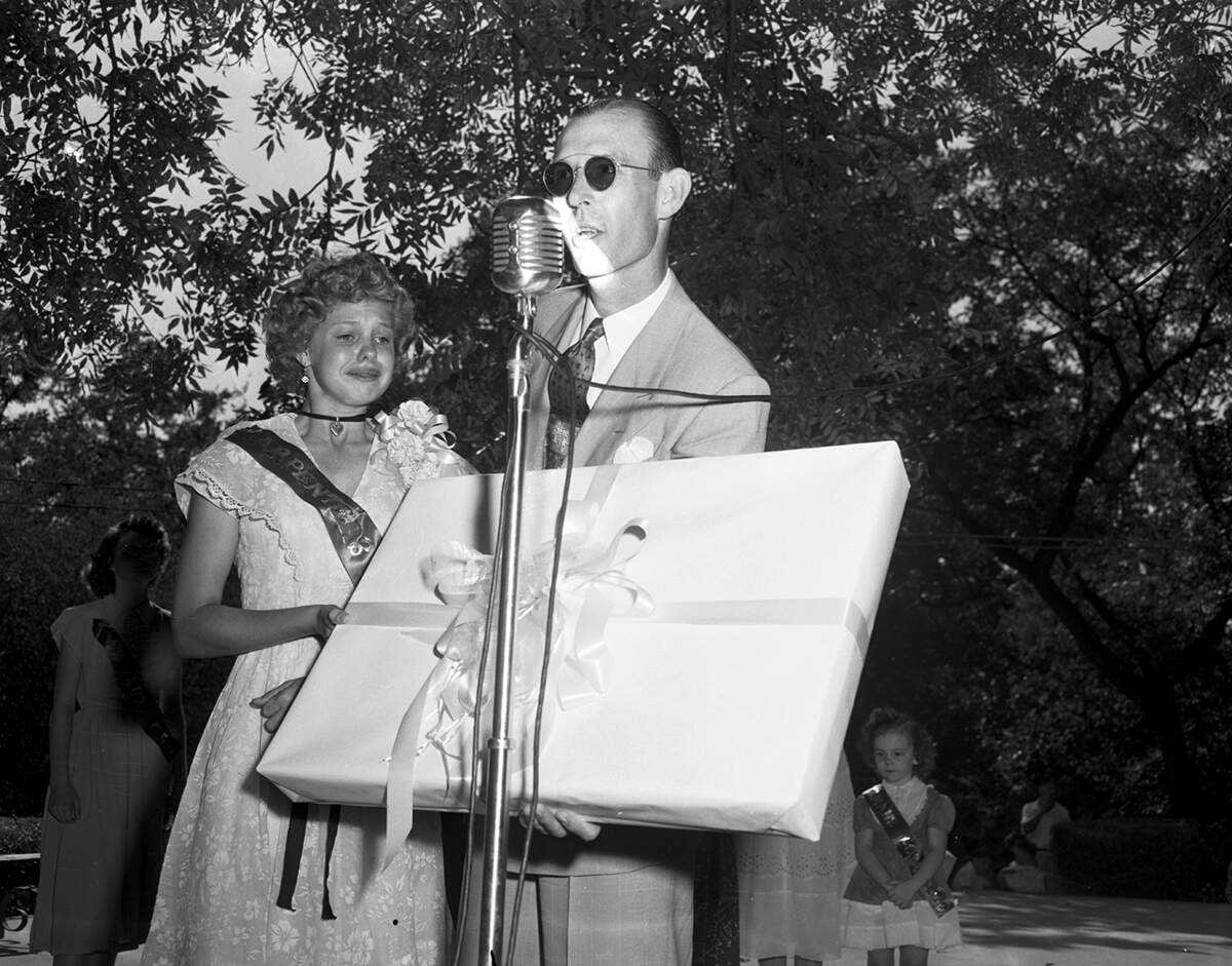 Sept. 4, 1951: Joyce Dell Luster, chosen Labor Day queen at Sycamore Park, thanked her voters then broke into happy tears as she received her gift from Dan Lacy, president of the Trinity State Bank. She was sponsored by the Carpenters Local 1822 and is the daughter of Mr. and Mrs. Hugh E. Luster of 1508 East Allen.
