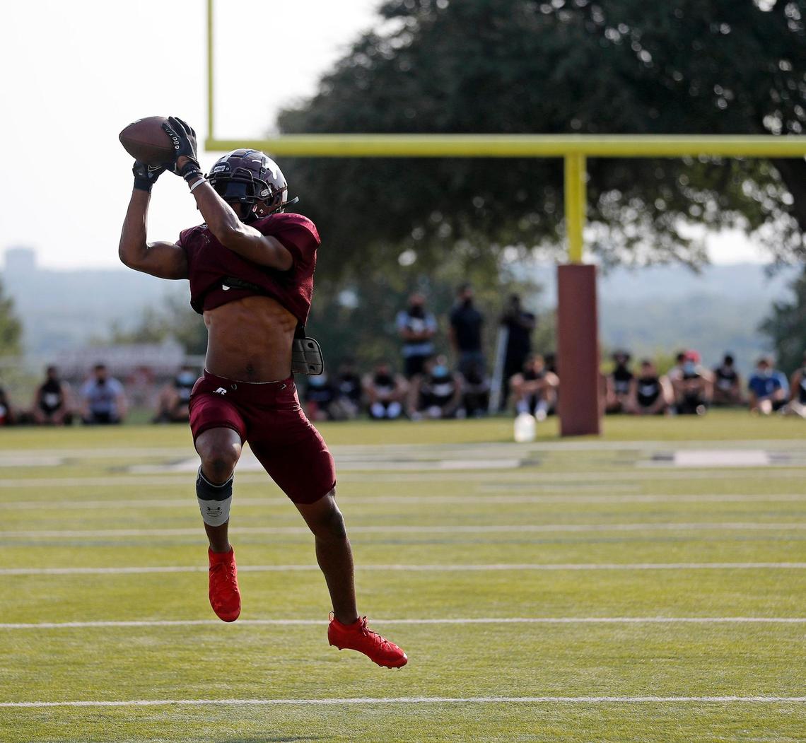 North Side receiver Da’Wain Lofton hauls in a pass during Thursday’s scrimmage against Southwest Christian at North Side High School.
