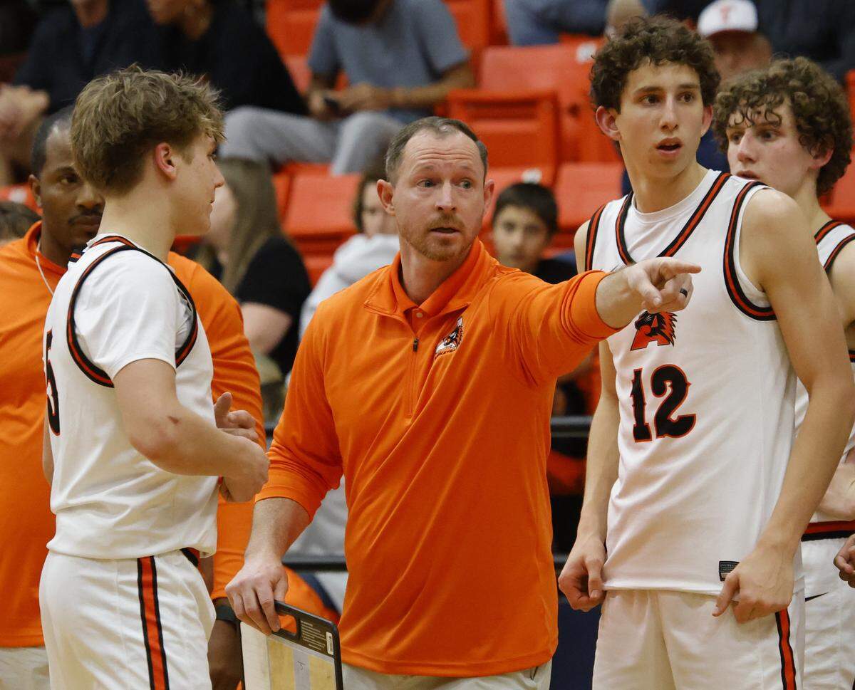 Aledo head coach Drew Baker gets clarification on possession against Brewer during the second half of a UIL boys basketball game at Aledo High School in Aledo, Texas, Friday Feb. 13, 2026.