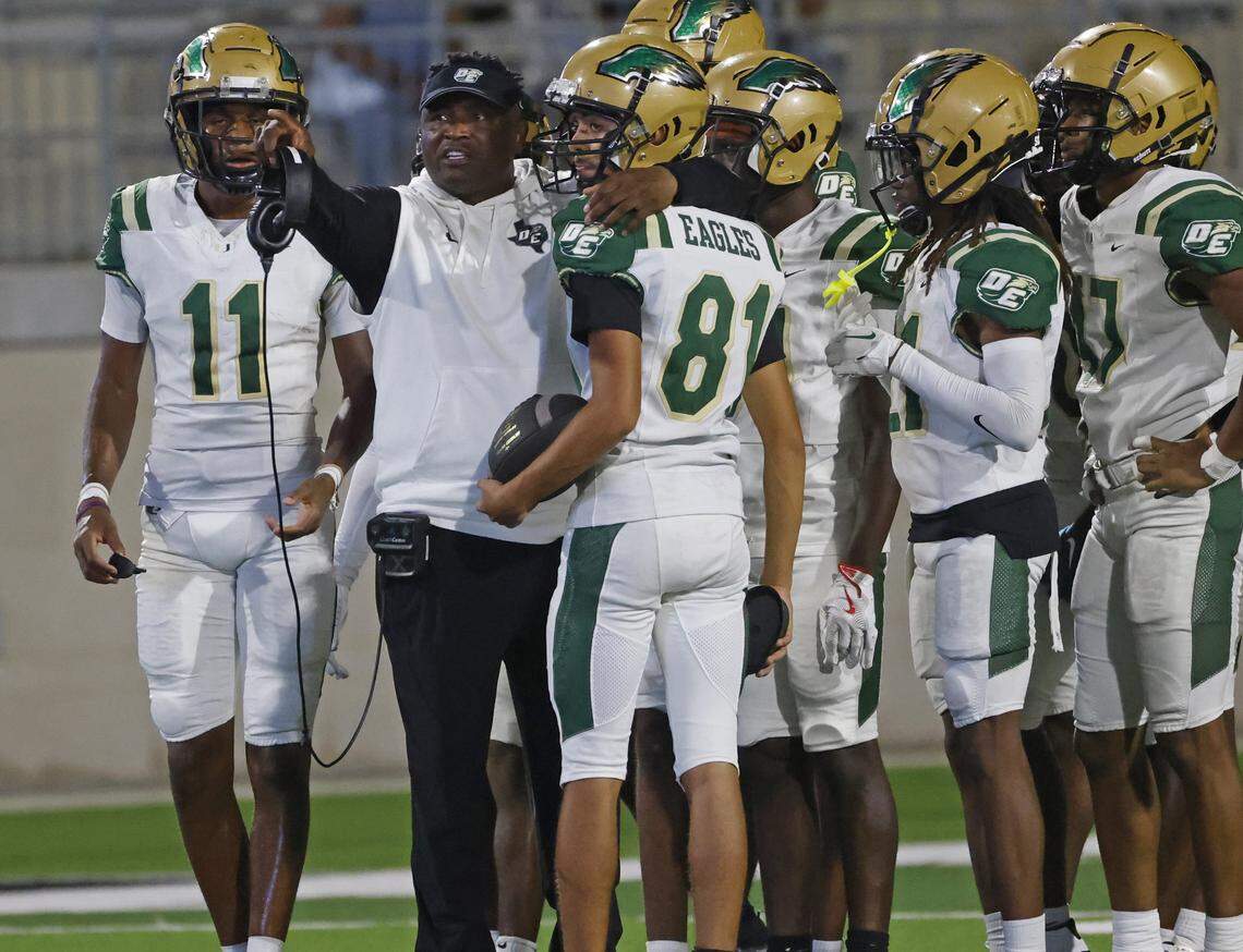 DeSoto head coach Claude Mathis points out a something during a timeout in the first half of a UIL football game between DeSoto and North Crowley at Crowley ISD Multi-Purpose Stadium in Fort Worth, Texas, Friday, Sept. 05, 2025.