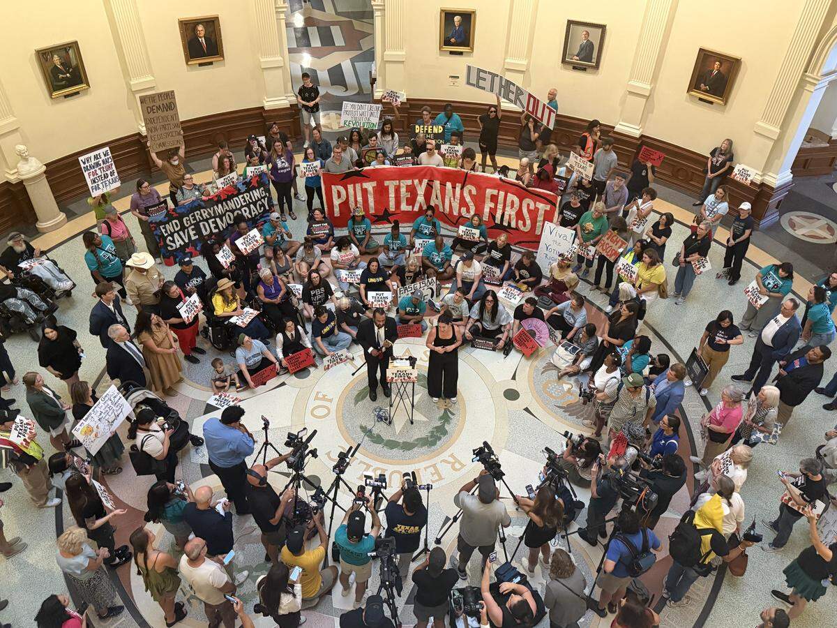 Opponents of Texas’ mid-decade redistricting plan rally at the Texas Capitol on Aug. 20, 2025.