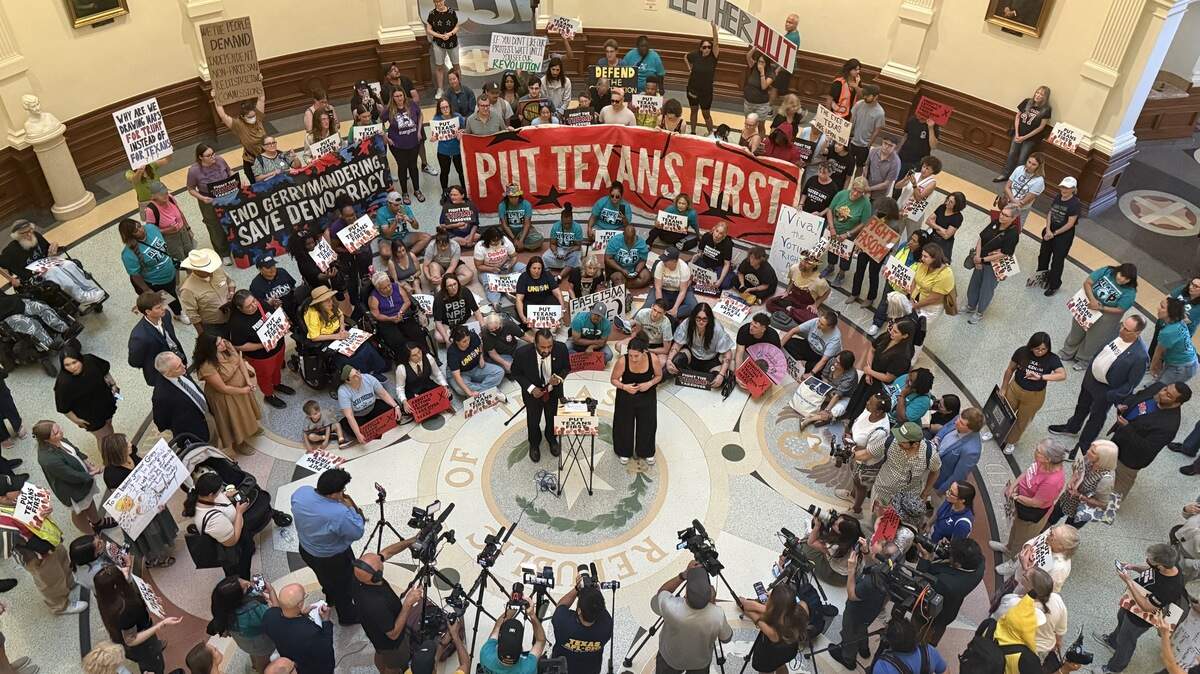 Opponents of Texas’ mid-decade redistricting plan rally at the Texas Capitol on Aug. 20, 2025.