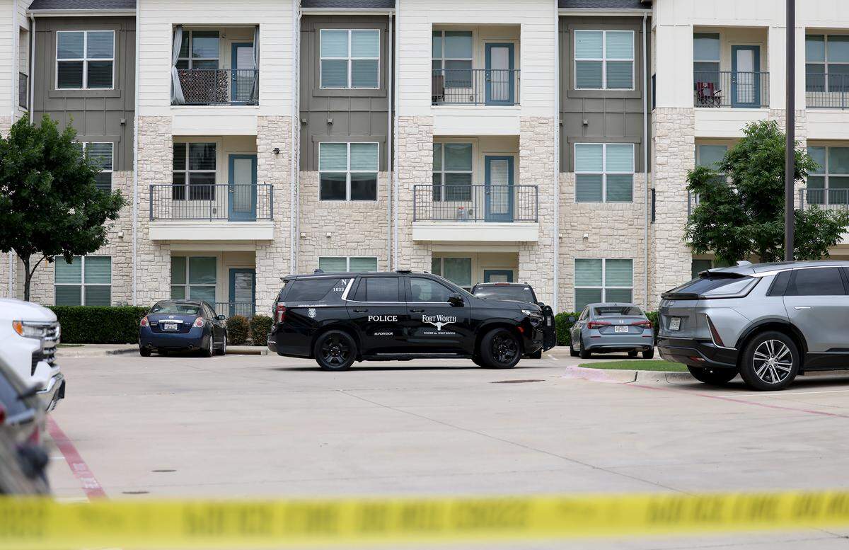 Fort Worth police respond to an officer-involved shooting on Tuesday, May 5, 2026, at an apartment complex in the 3600 block of Outlet Boulevard, near Tanger Outlets mall on the city’s far north side.