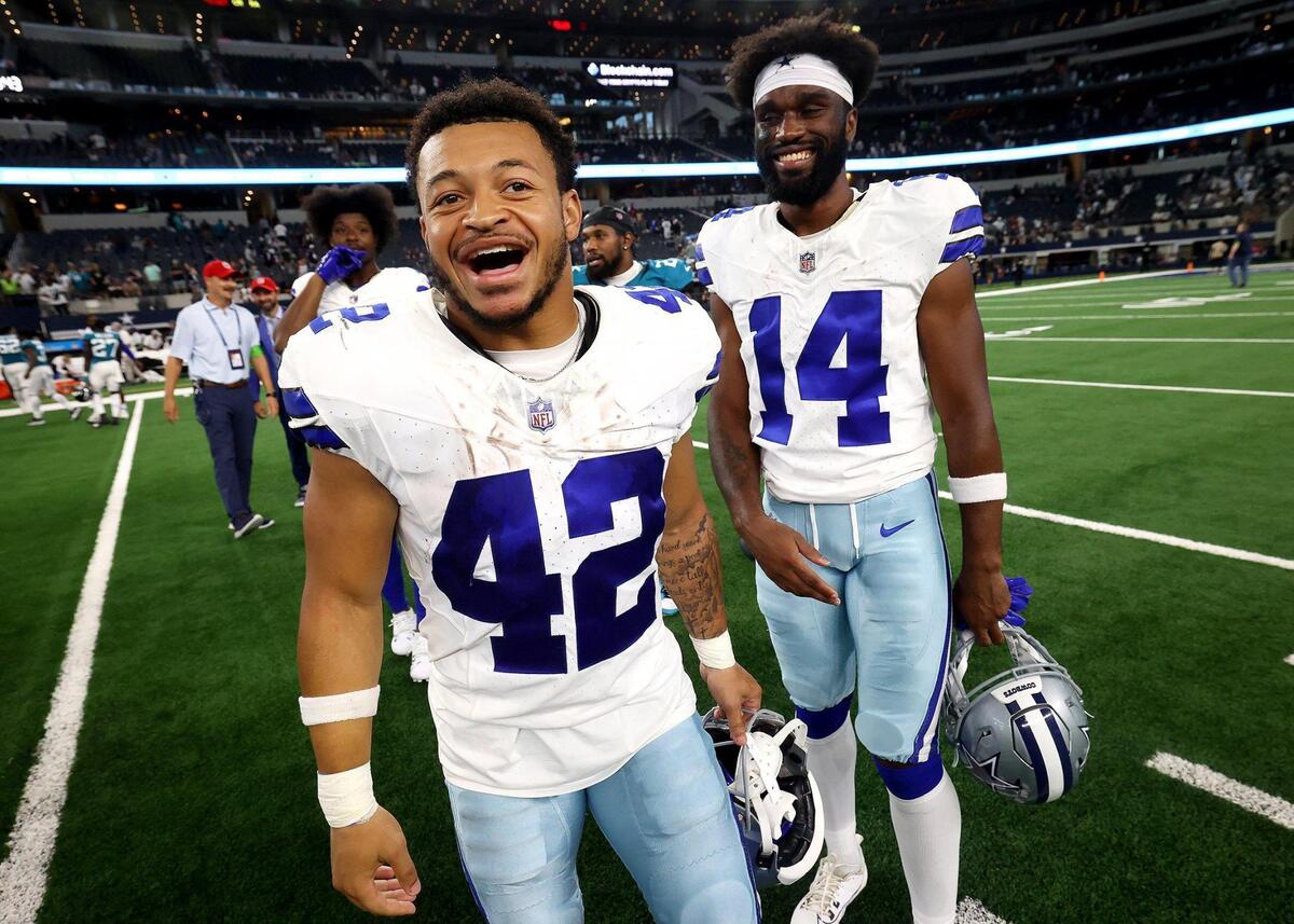 Dallas Cowboys running back Deuce Vaughn (42) and wide reciever Jose Barbon on the field after the preseason loss to the Jacksonville Jaguars on Saturday, August 12, 2023, at AT&T Stadium in Arlington.