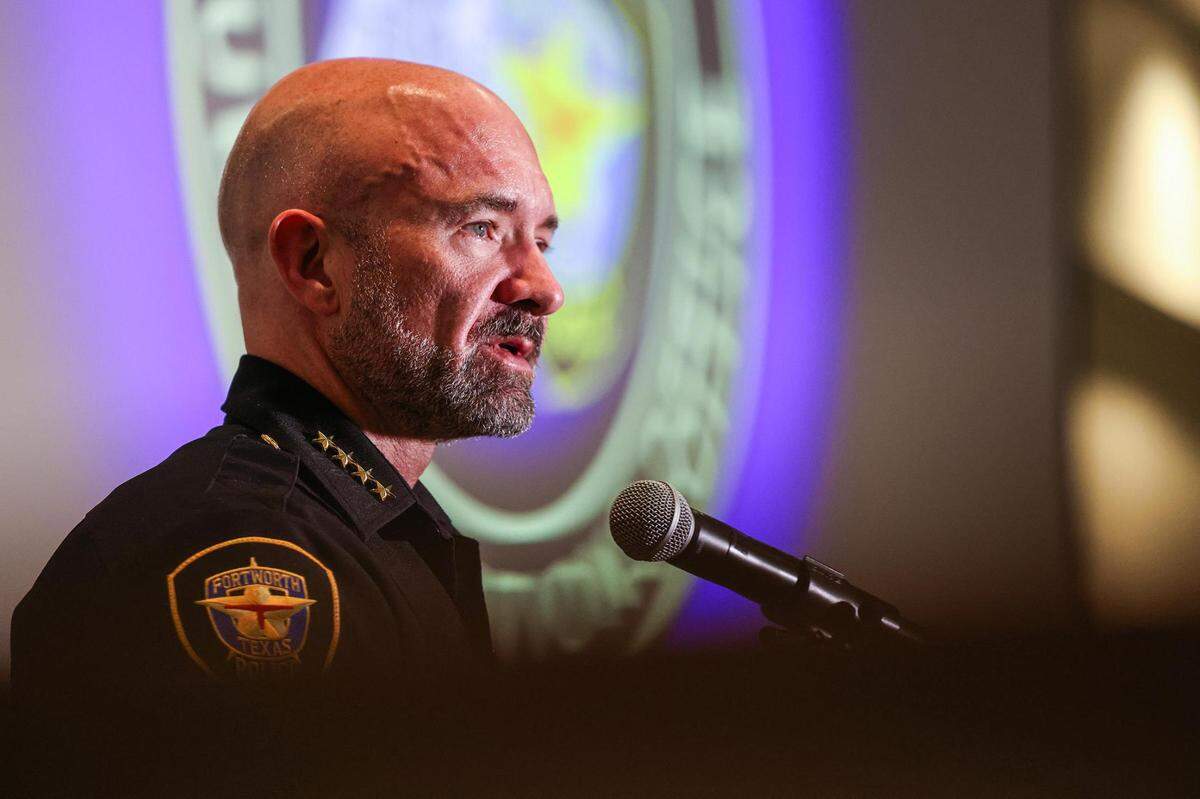 Chief Neil Noakes in profile at a podium.