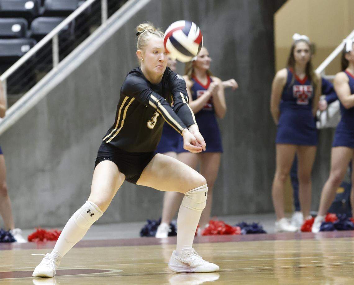 Fort Worth Eagle Mountain defensive specialist Sophie Burdock (3) sets up a shot against Wimberley during the second set of the UIL Class 4A Division II state volleyball championship game Friday Nov. 21, 2025 at Curtis Culwell Center in Garland, Texas.