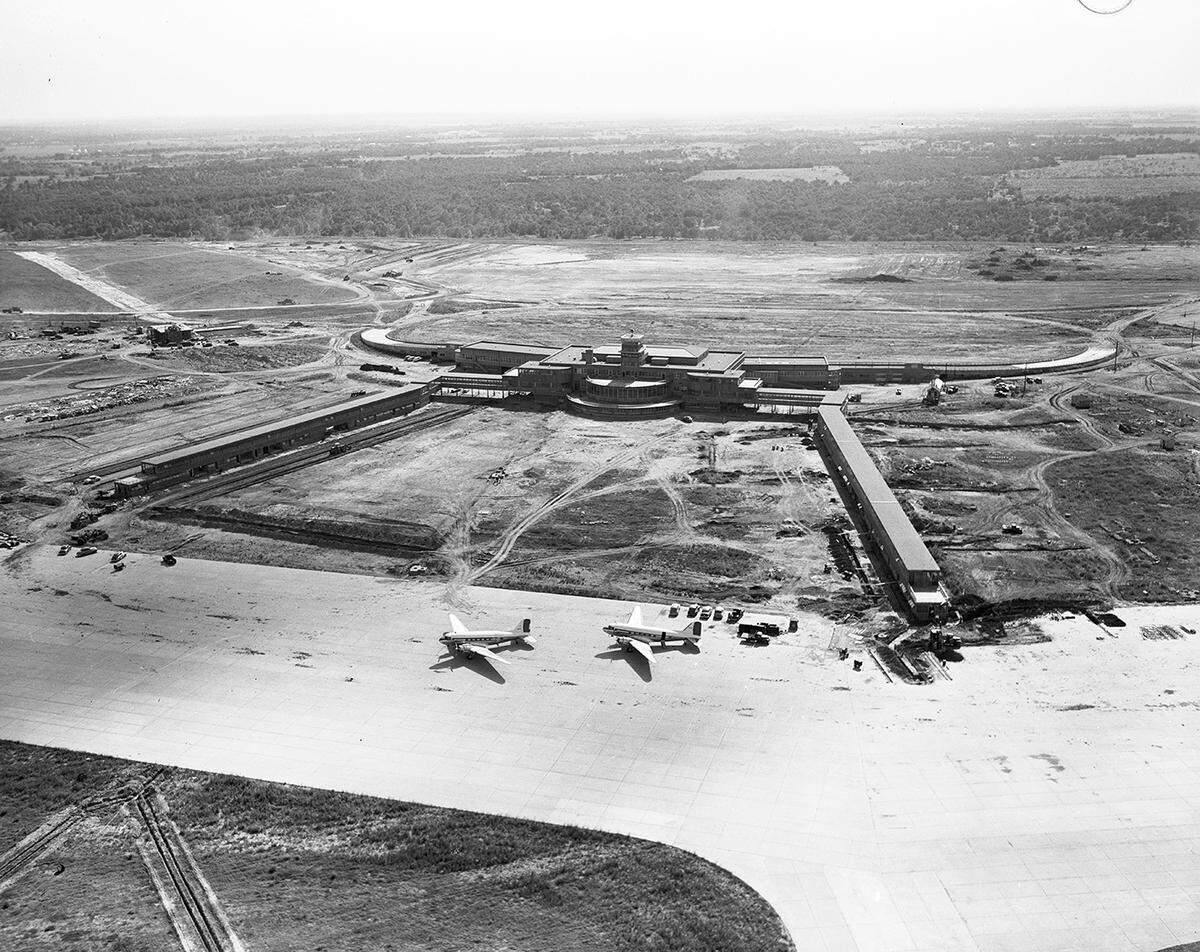 June 4, 1952: “Although still far from complete, the Greater Fort Worth International Airport near Euless is beginning to make an impression, as show in this aerial photograph. Every known modern facility for the handling of aerial traffic is being incorporated in the giant terminal, which includes Amon Carter Field and Administration Building.”