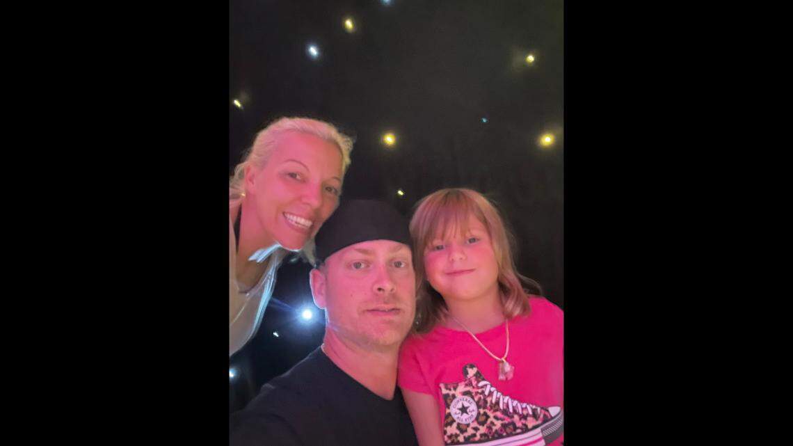 Paisley and her parents.