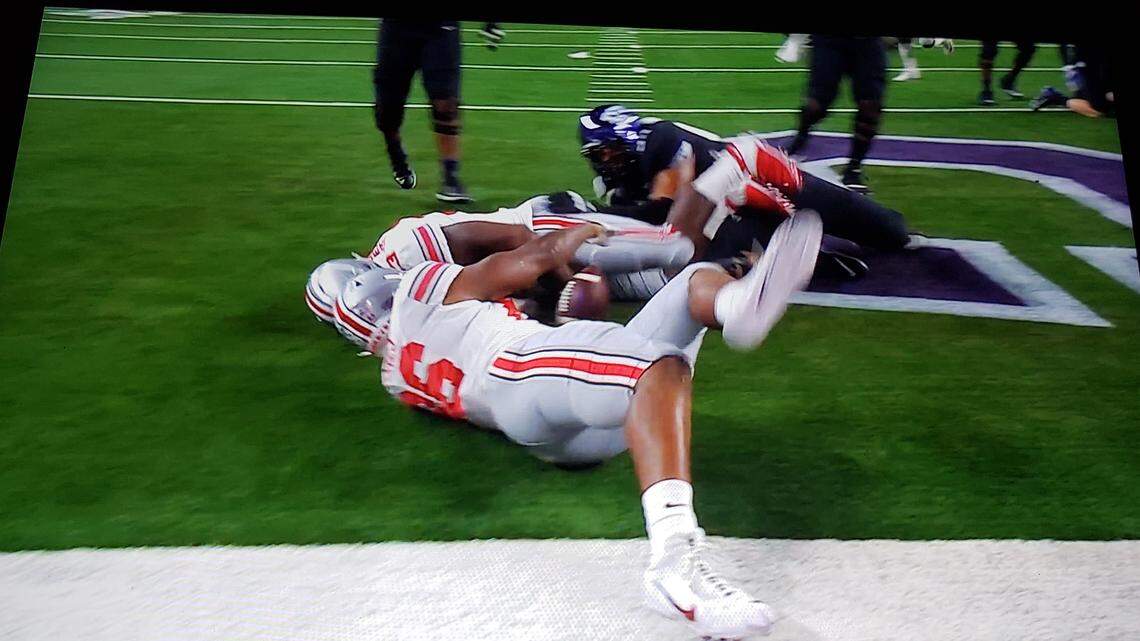 A TCU fumble was recovered by Ohio State in the end zone for a touchdown in the first quarter Saturday night but replays showed that the ball was touched by a player with his foot out of bounds, which should have resulted in a safety.  The officials never consulted replay and the play stood as a touchdown, giving the Buckeyes a 10-0 lead.