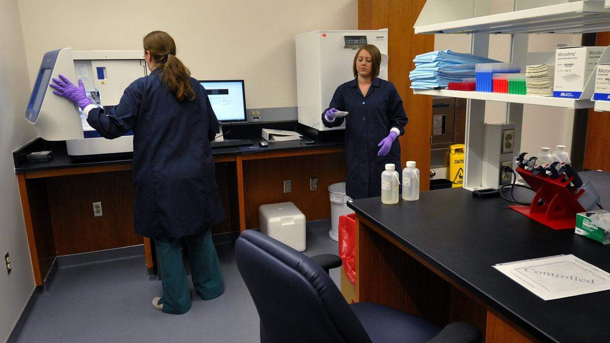 Trisa Crutcher, right, sued the city for retaliation after she raised concerns about practices in the crime lab. 