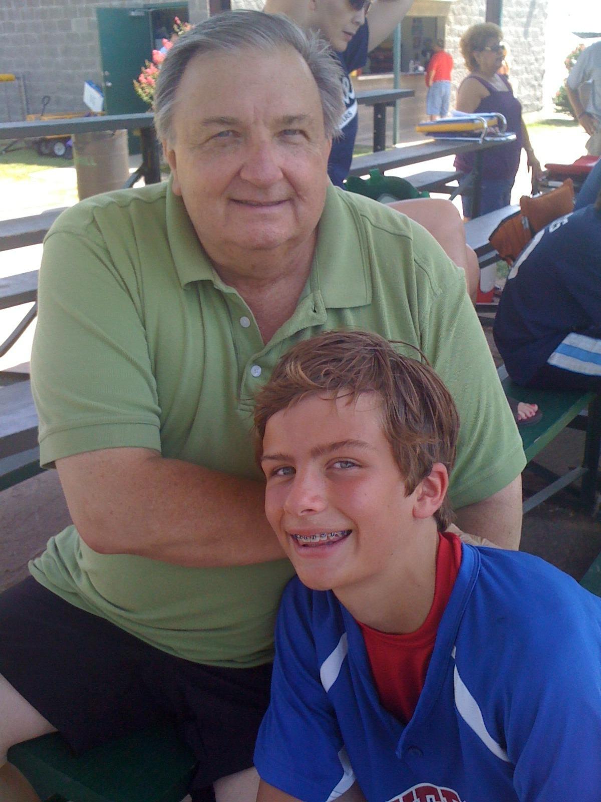 From Dorothy Blackman: Mike and 12-year-old Sawyer (aka “the apple of his eye”) taking a break between baseball games. Sports was one of their favorite father and son activities. This was Mike’s favorite picture. June 2, 2012