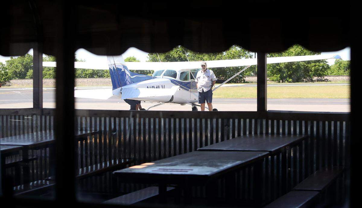 A customer arrived via airplane to Beacon Cafe.