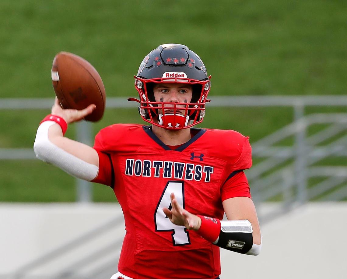 Northwest quarterback Jake Strong (4) tosses a short pass to the flat in the first half of a high school football game at Northwest ISD Stadium in Justin, Texas, Friday, Sept. 02, 2022. With 48 seconds remaining in the half Northwest took the lead ahead of McKinney North 13-10. (Special to the Star-Telegram Bob Booth)