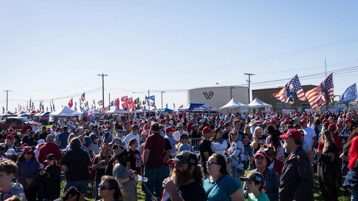 People wait in a growing line to enter Donald Trump’s Make America Great Again Rally in Waco on Saturday.